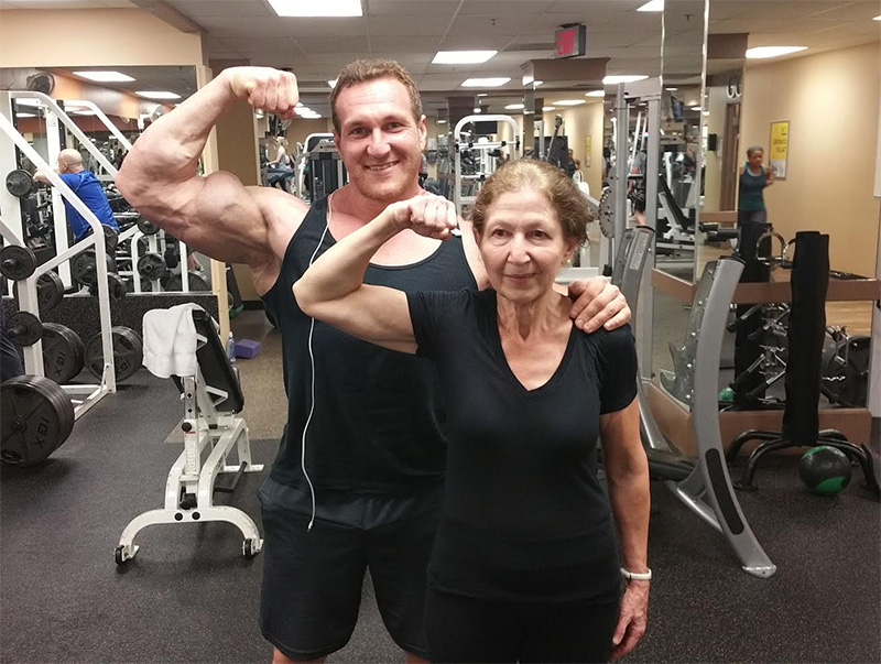 Older adult performing balance exercises with trainer in Washington DC